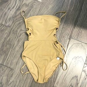 Small one piece tan-colored swimsuit from Aerie.